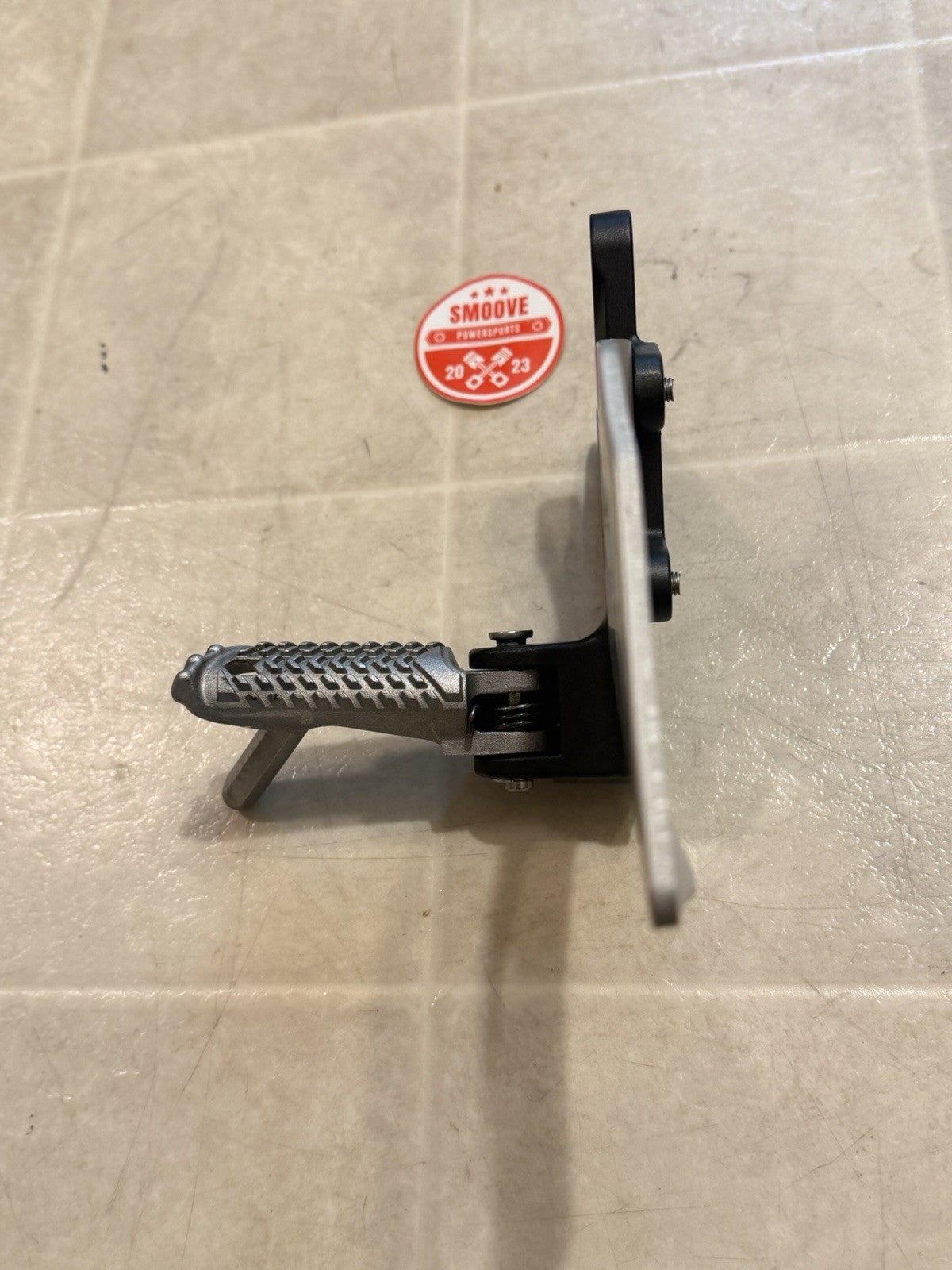 2021-2025 KAWASAKI NINJA ZX10R OEM LEFT RIDER FOOT PEG REST W/ BRACKET